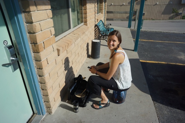 Alison cooking up some coffee outside of Motel 6 using our camping stove...deluxe!